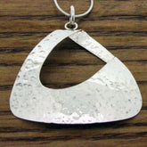 Beaten sterling silver unusual pendant